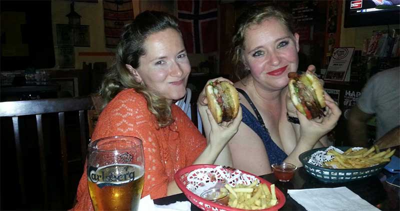 Expat girls gorging in a pub