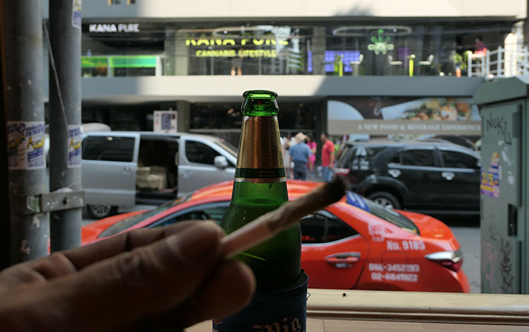 Drinking a Chang and smoking a joint in Bangkok
