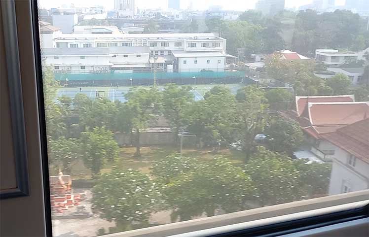Window view from Bangkok Airport rail link train